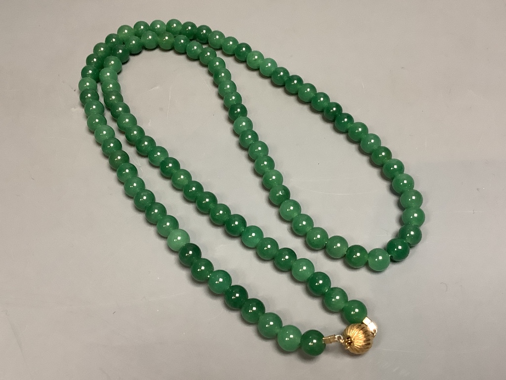 A single strand simulated jade bead necklace with 14k clasp